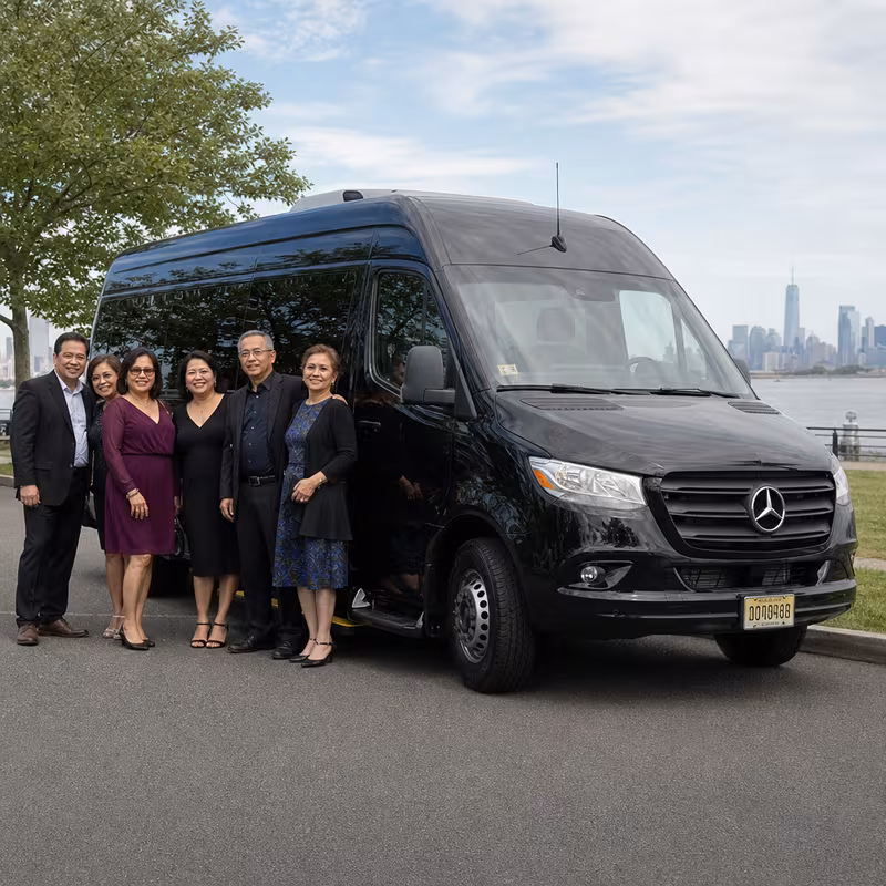 Group beside a Mercedes Sprinter limo from the Newark fleet