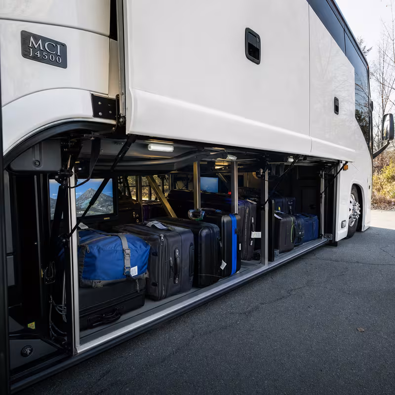 Party bus interior with wraparound leather seating and LED lighting in Newark