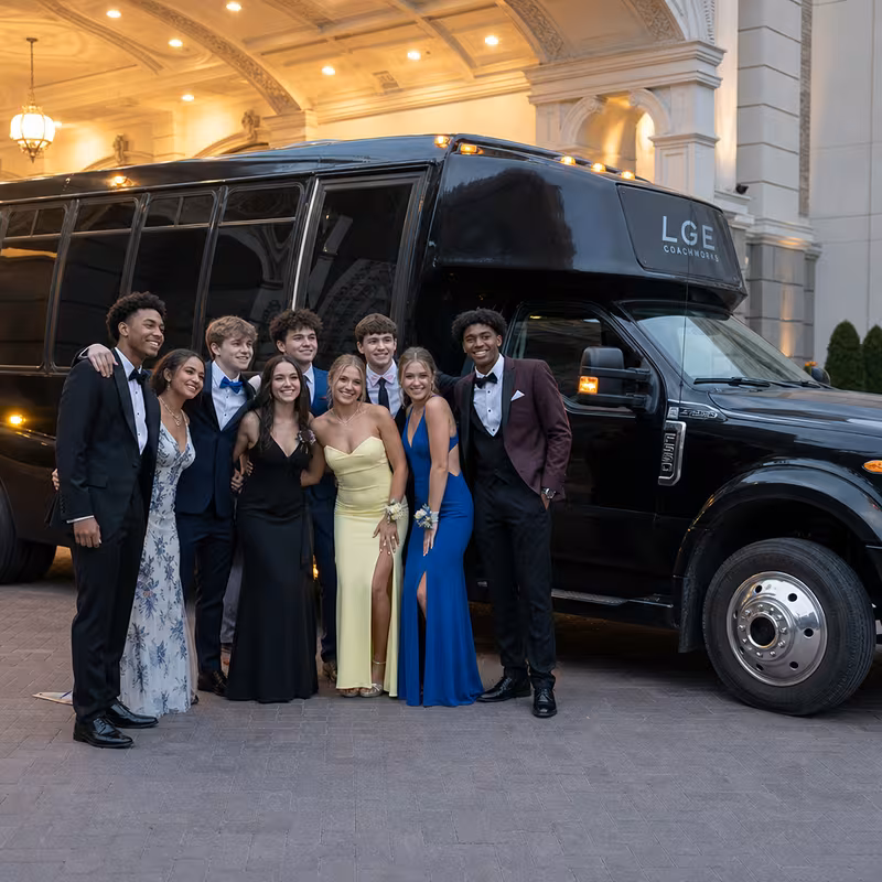 Party bus interior with wraparound leather seating and LED lighting in Newark