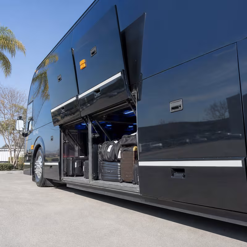 Party bus interior with wraparound leather seating and LED lighting in Newark