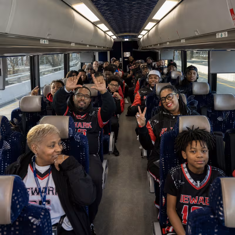 Black Mercedes Sprinter van staged for an Newark Sporting Event Transportation group