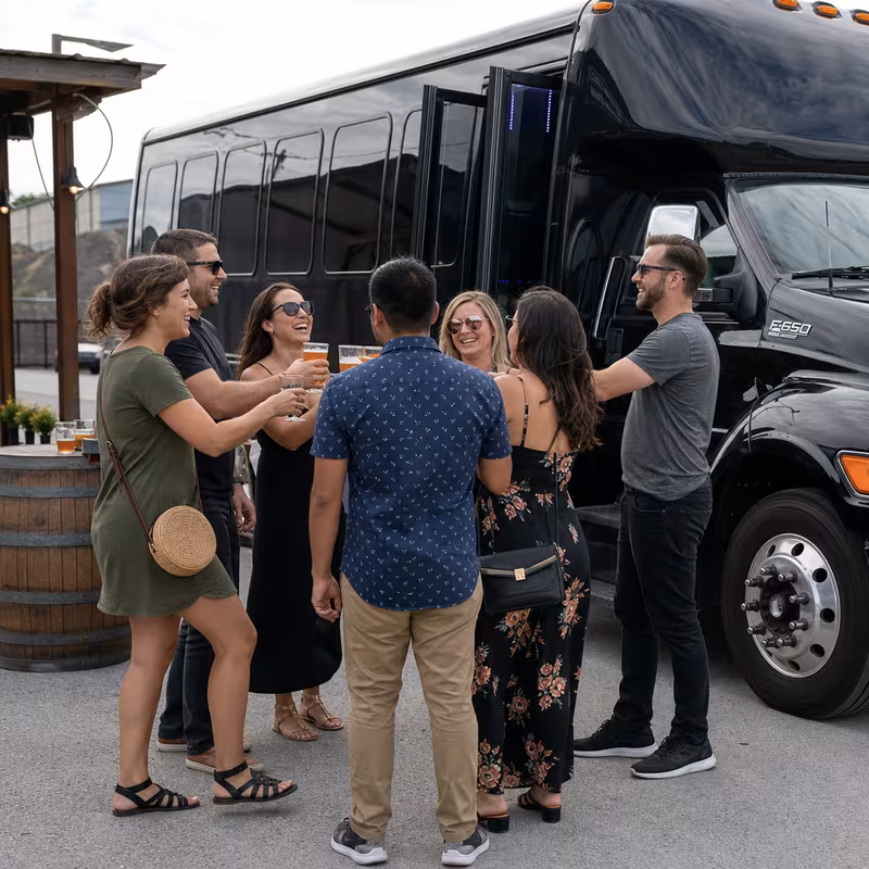 Passengers loading luggage while boarding an Newark group shuttle